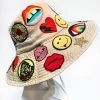 Adina- Bucket Hat W/ Allover Hippie Patches -dress and personal adornment HATSIDEVIEWONMANNEQUIN min